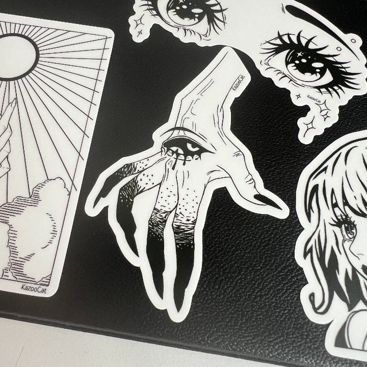 Black clipboard with this sticker attached