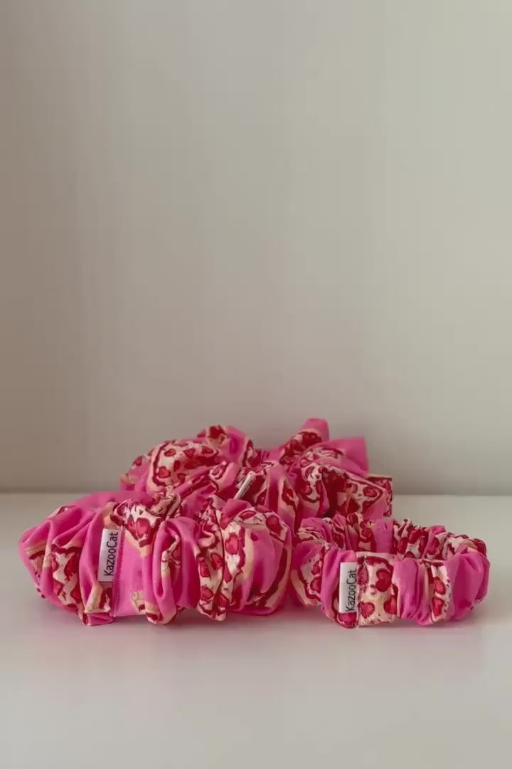 Pizza Heart Scrunchie - Pizza Lovers Valentine's Hair Accessory on a Pink Glitter Background